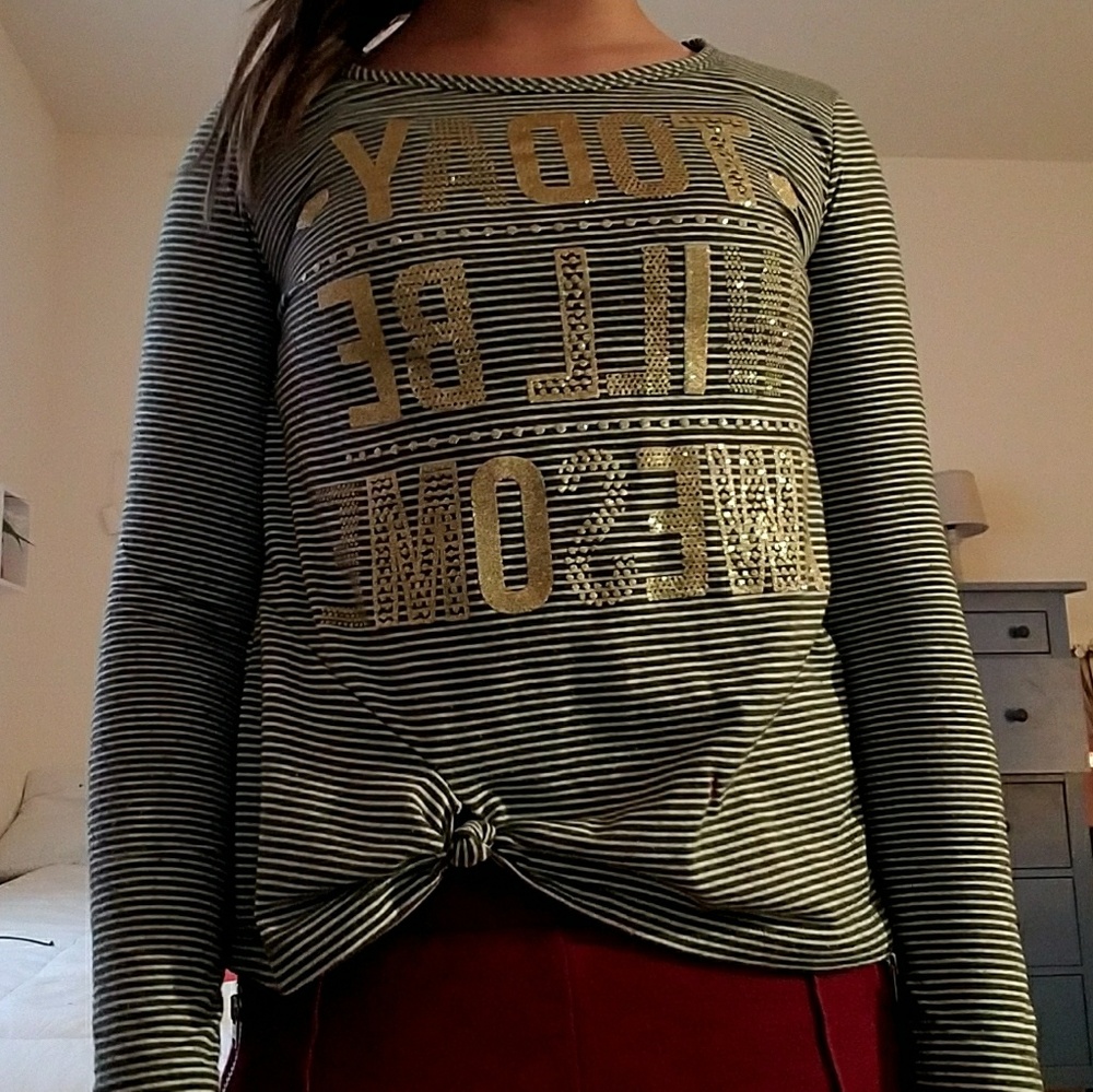 A long sleeve shirt and knot in front